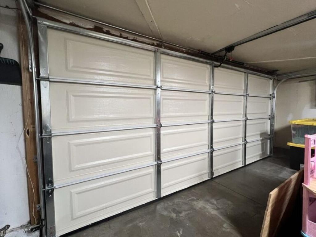 Garage door spring replacement at 2733 Via Orange Way, Spring Valley, CA 91978.